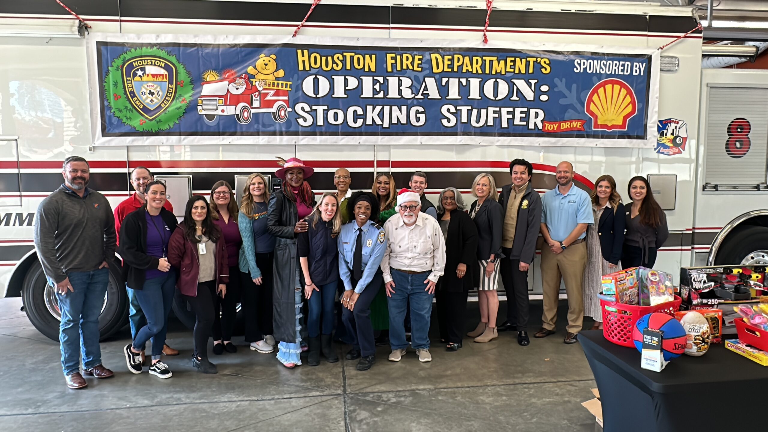 Group photo from the Houston Fire Department's Annual Operation Stocking Stuffer Toy Drive kick-off event on November 3, 2023, at Fire Station 8.